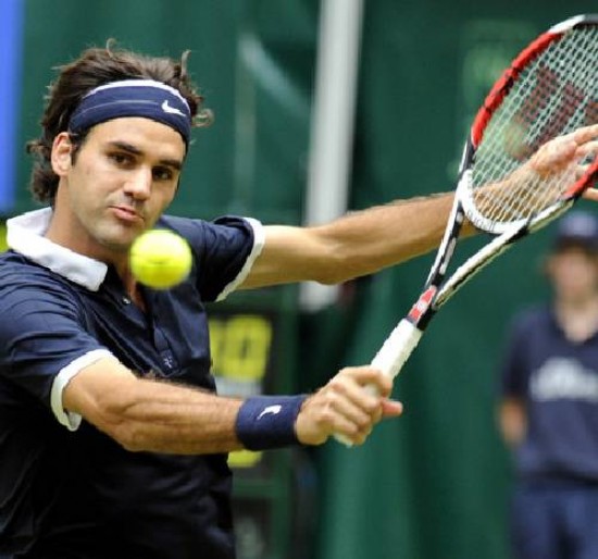 Federer volvi al csped con una cmoda victoria.